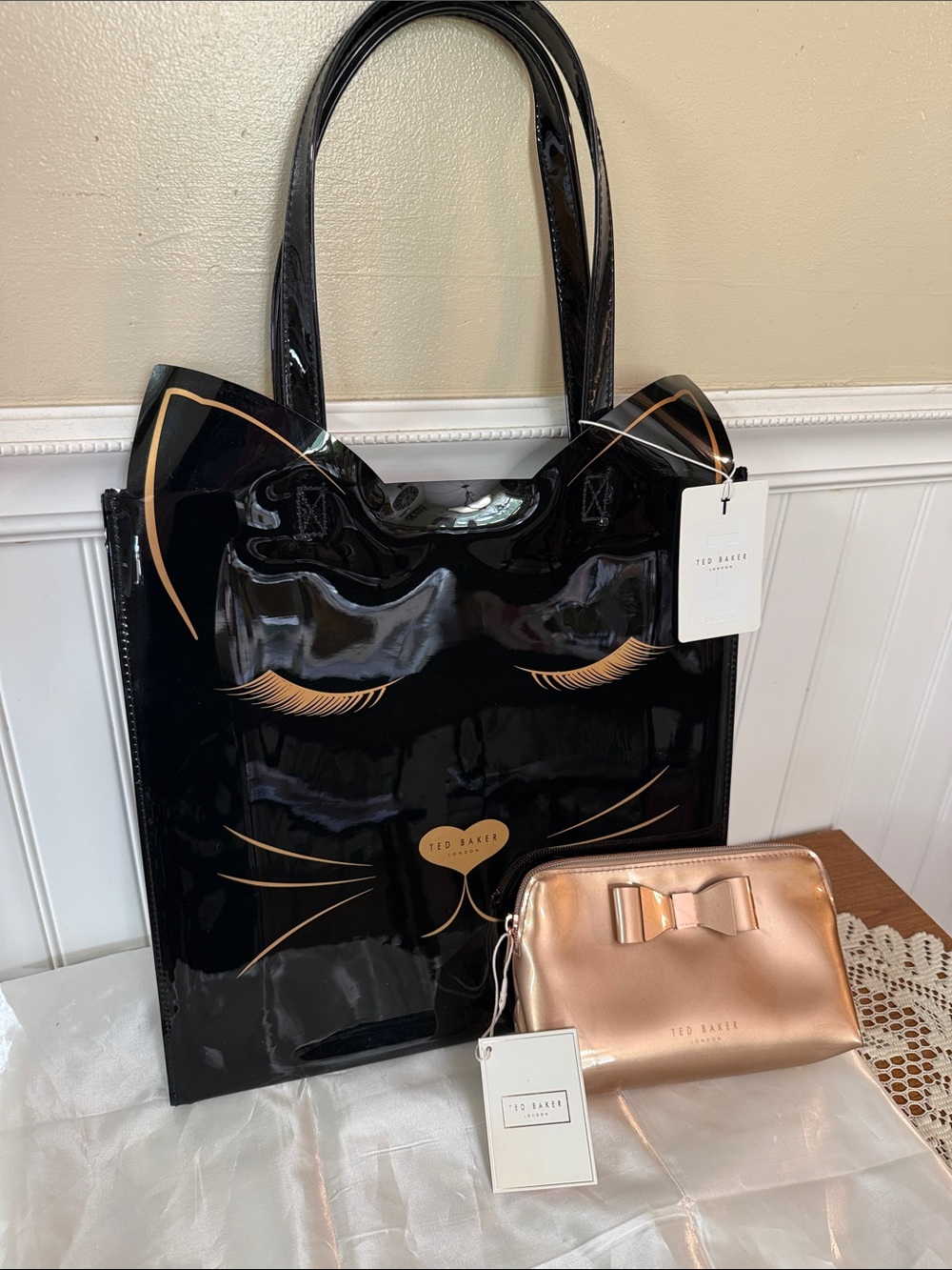 Ted Baker London black cat silhouette vinyl tote bag w/matching cosmetic bag.
